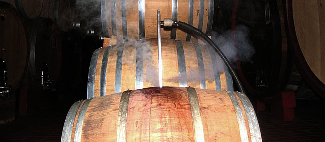 high power steam cleaning sanitizes wine barrels, bottling lines and production areas