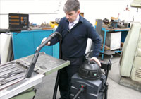 Factories Cleaning with a Batvac 50 and a vacuum hose Factories Cleaning with a Batvac 50 and a vacuum hose