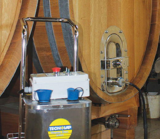 securing the steam cleaning equipment to the vat, with an industrial grade steel connection