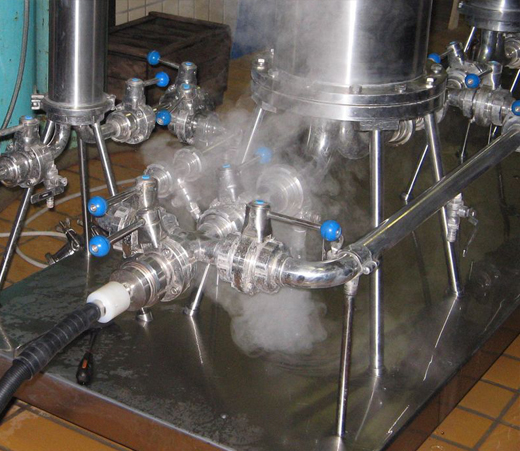commercial cleaning equipmnent sanitises winery bottling lines, using high temperature, pressurised steam vapour